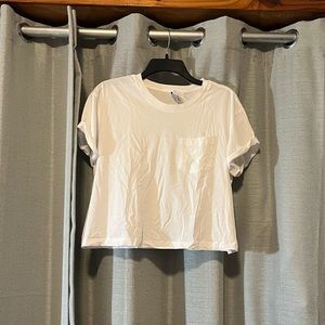 White crop top from H&M divided.